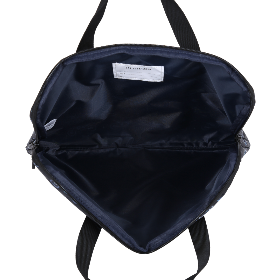 Inside of library bag with blue lining fabric and name label